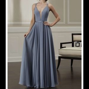 Exact dress in a burgundy/wine color. NEVER WORN